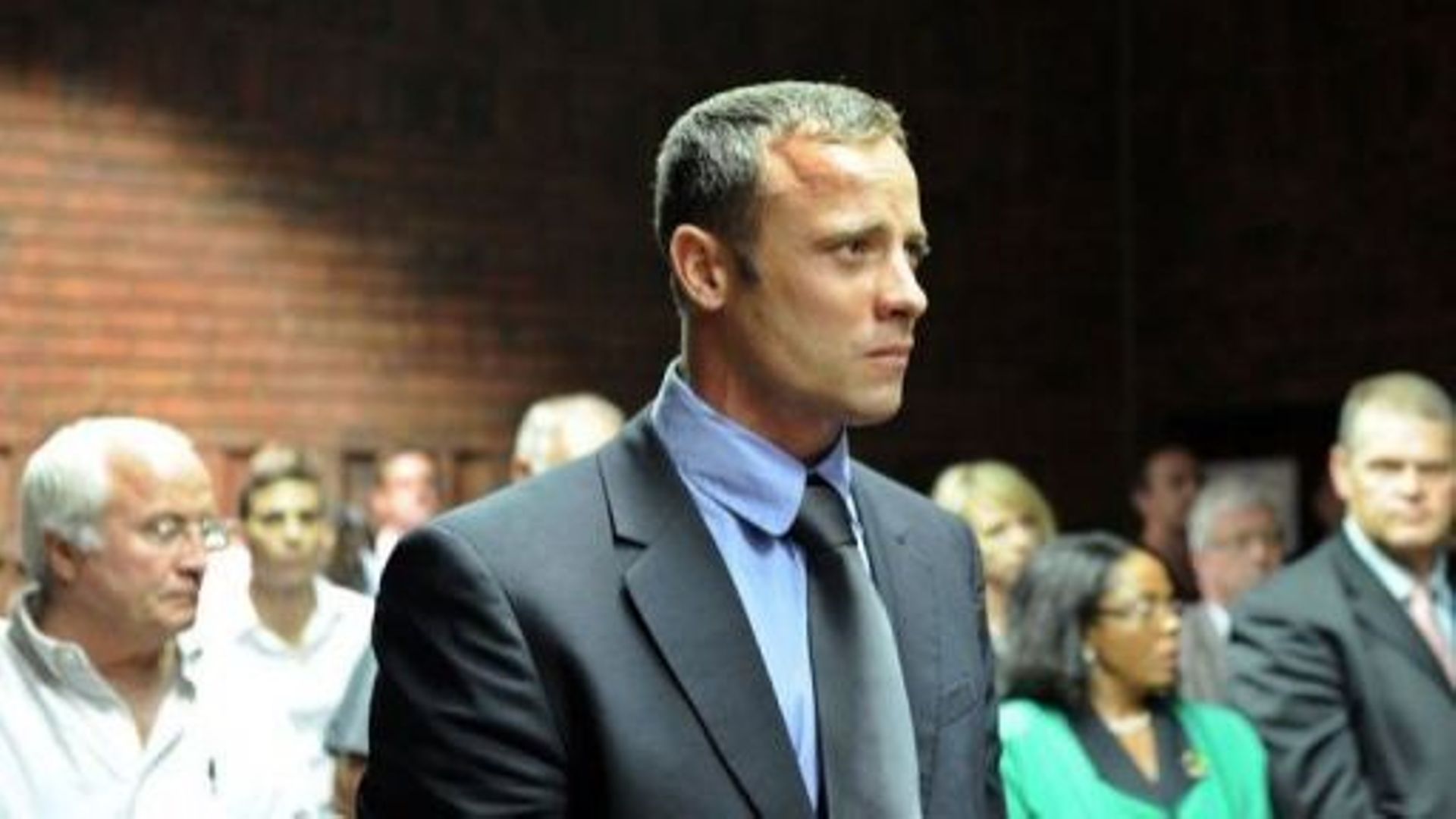 Oscar Pistorius, accusé de meurtre avec préméditation, au tribunal de Pretoria, le 19 février 2013