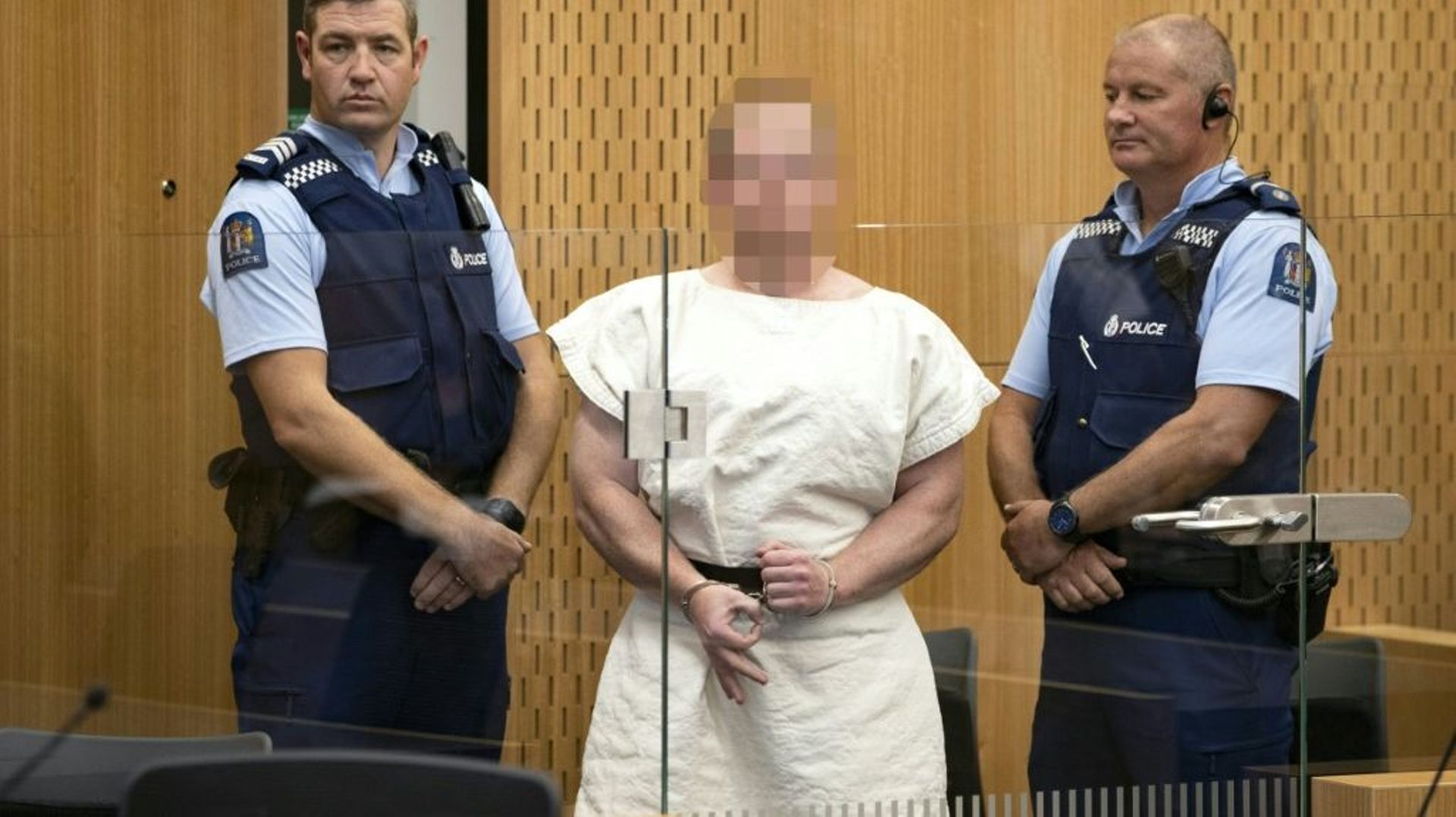 Brenton Tarrant (c), l'homme accusé du massacre de Christchurch massacre, fait une apparition au tribunal de Christchurch, le 16 mars 2019